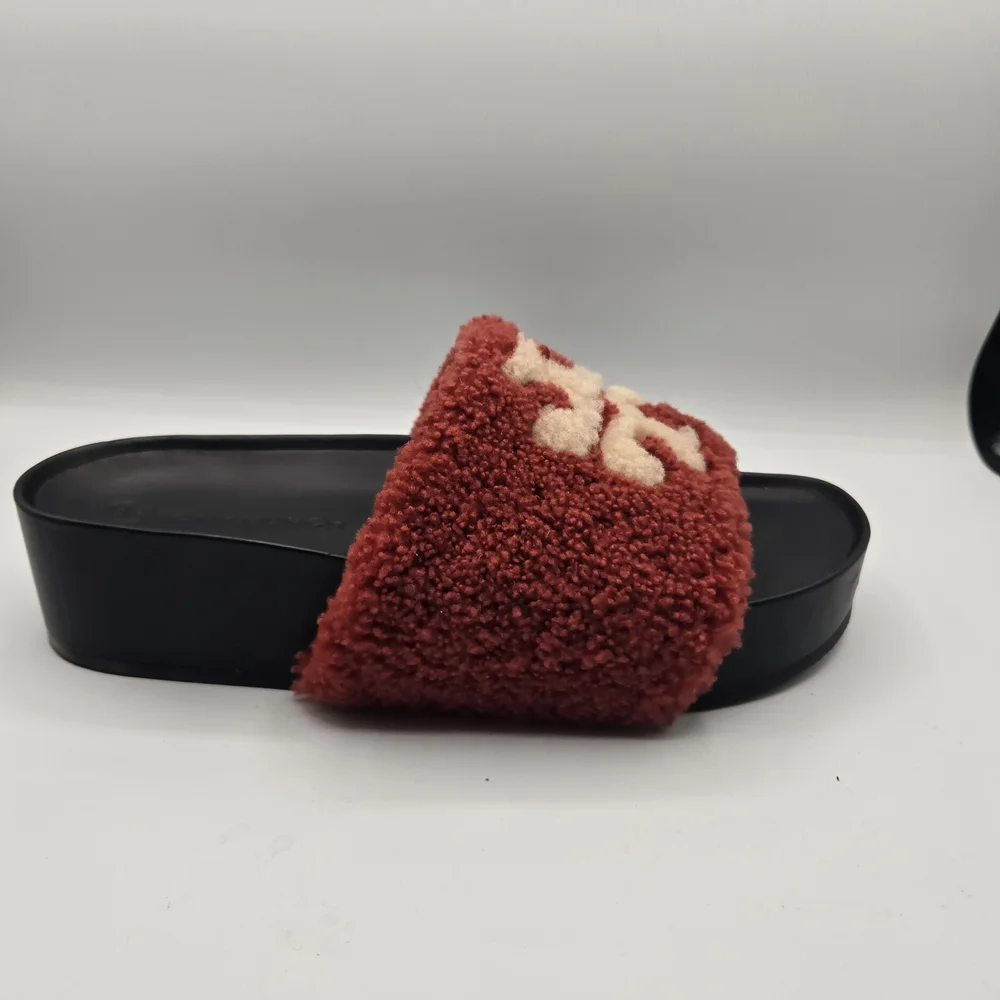 Tory Burch Double T Shearling Flatform Slide Sandals in a vibrant red and cream